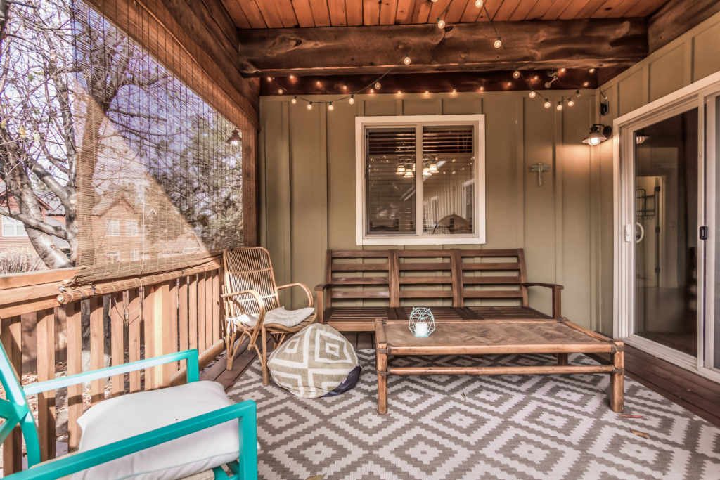 Enjoy quiet mornings or evenings on the back porch of this short term rental on the north side of Bend.