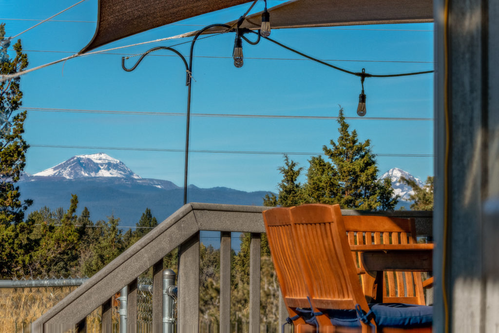 Furnished country living in Bend with great mountain views.