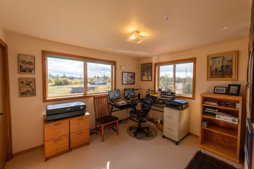 Furnished country living in this Bend executive rental includes an office with views.