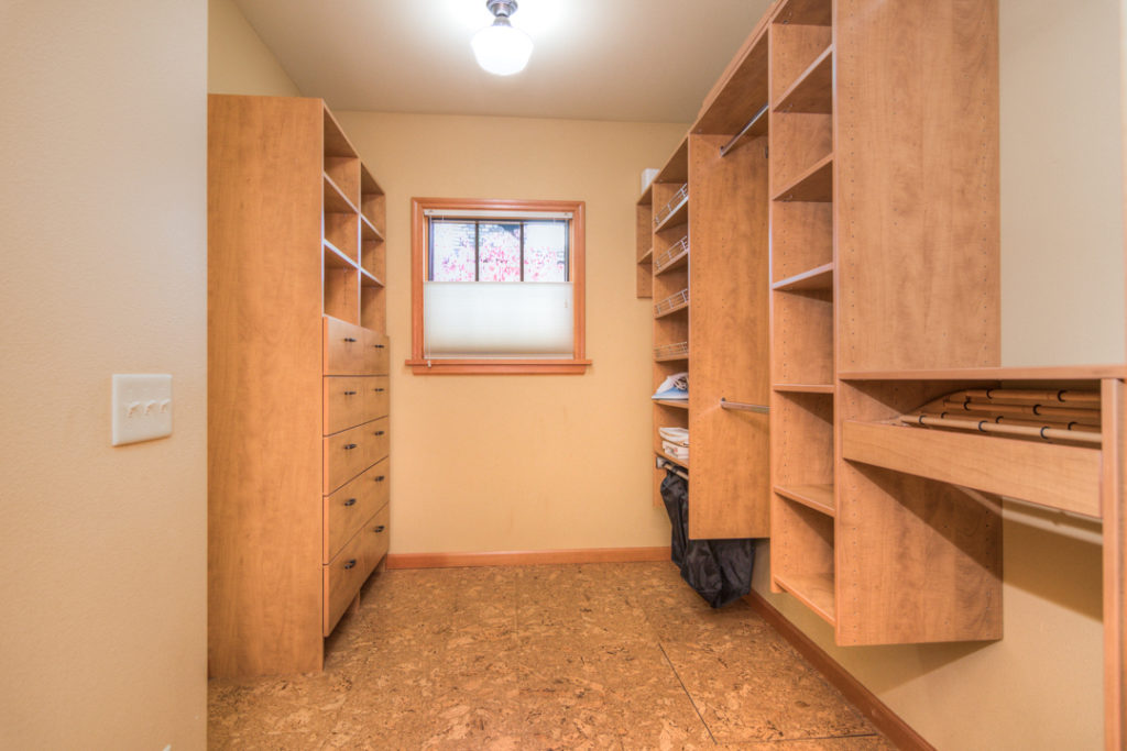 walk in closet of furnished executive rental in Bend