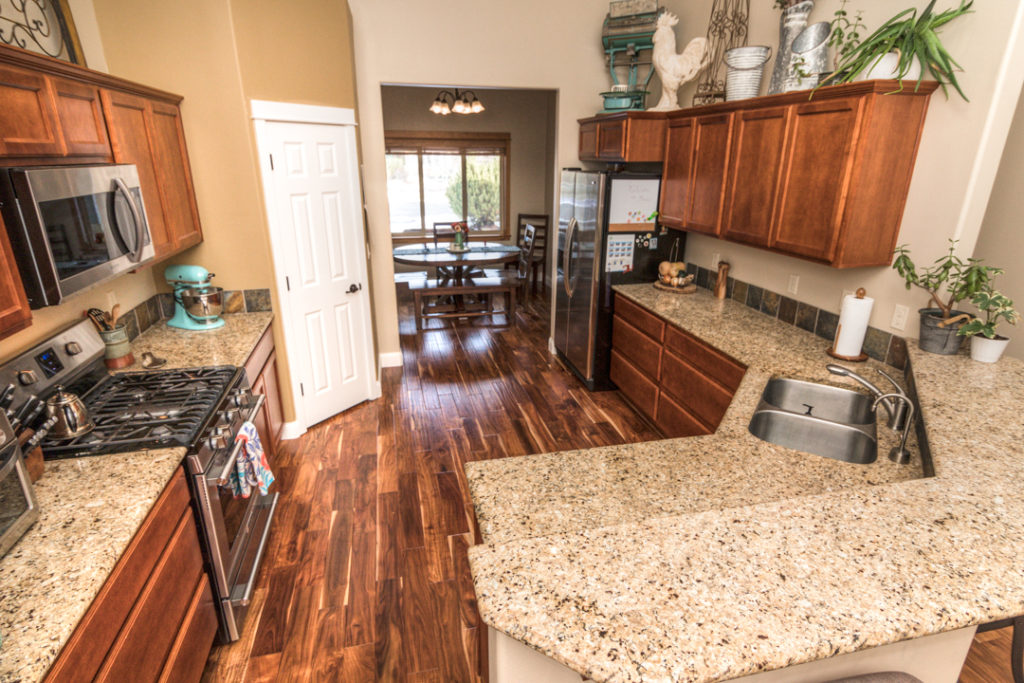 Granite counter tops in kitchen of furnished rental in northwest Bend