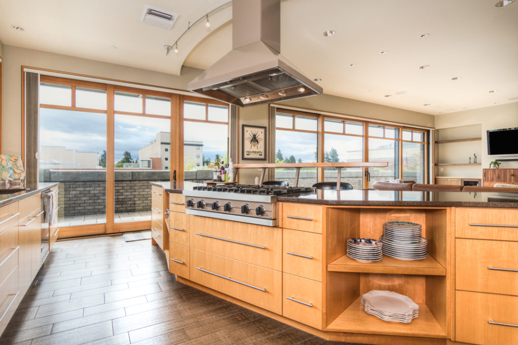 Kitchen with six burner gas range and incredible viewsin downtown Bend executive rental