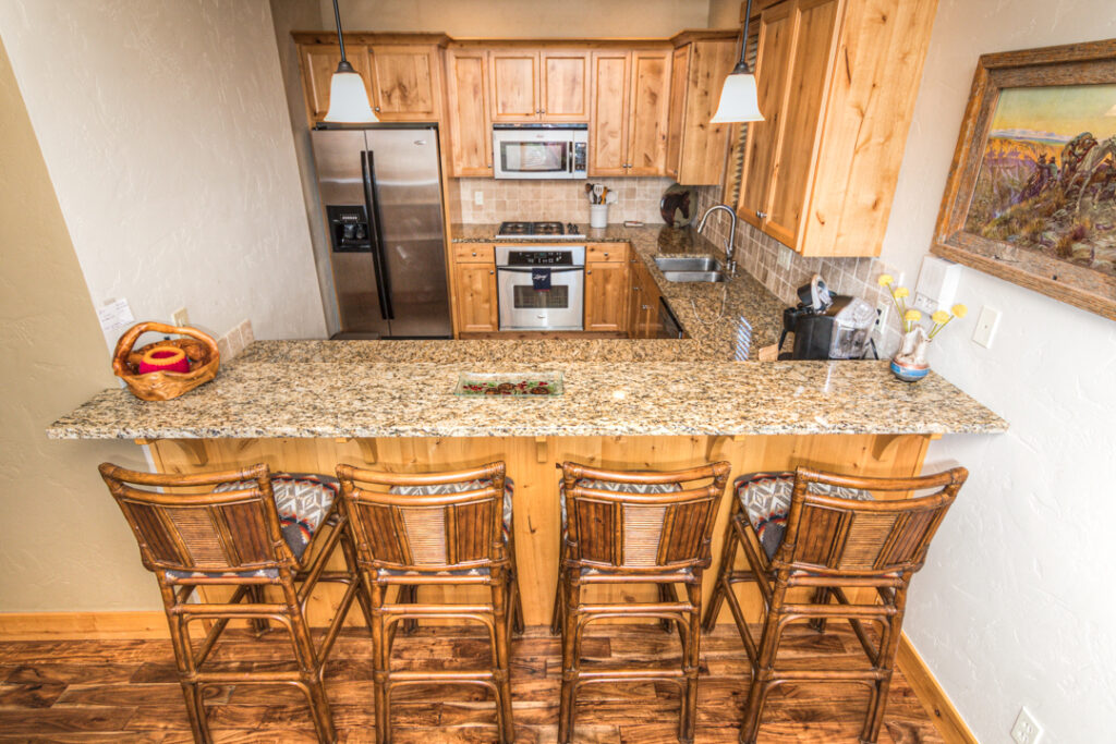 Granite counter tops in this Old Mill river rental