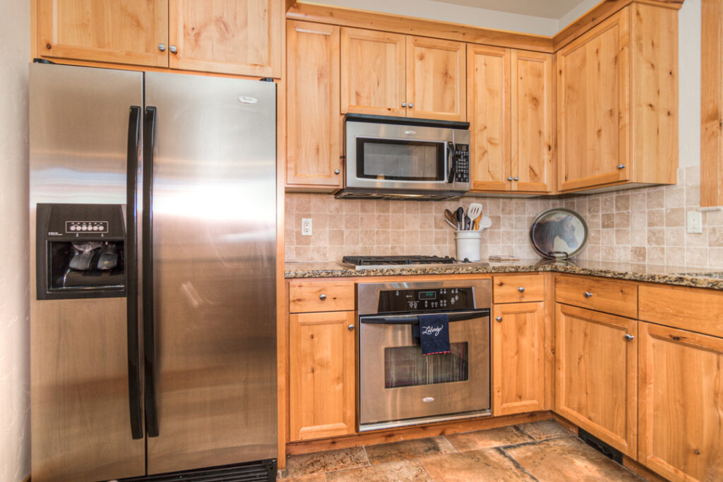 Stainless steel appliances in this beautiful kitchen