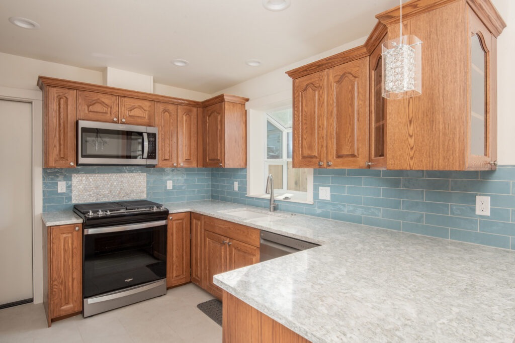 Quartz countertops in the kitchen of this downtown Bend rental