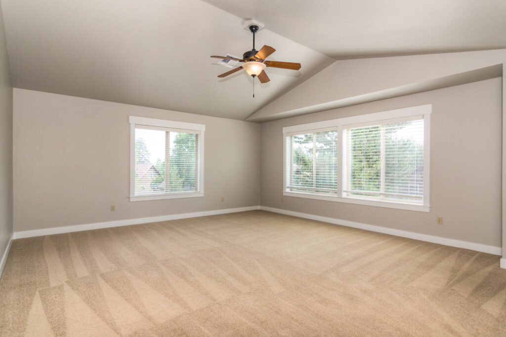 Upstairs in this rental in the Sagewood neighborhood of SW Bend you will find a large bonus room with lots of natural light.