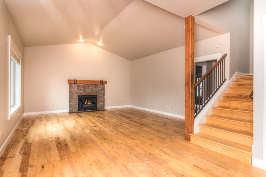 The living room of this rental in the Sagewood neighborhood of SW Bend has a gas fireplace.