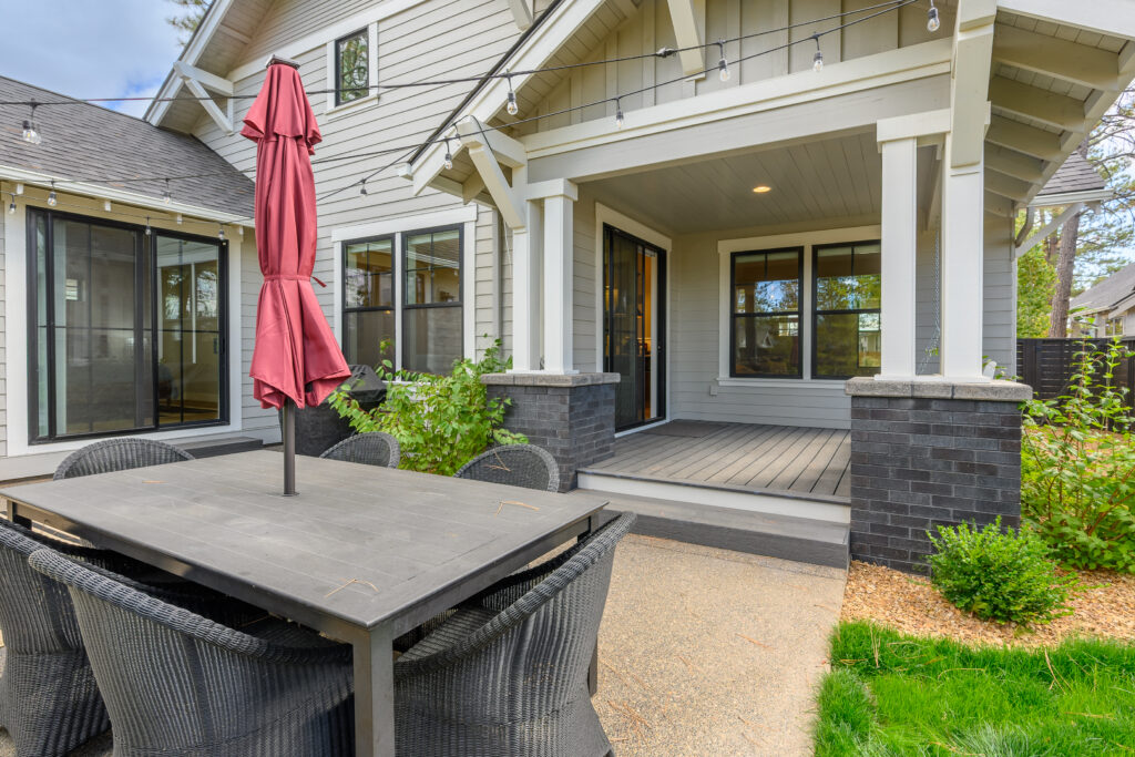 This executive rental in Discovery West has a covered deck in the back yard.